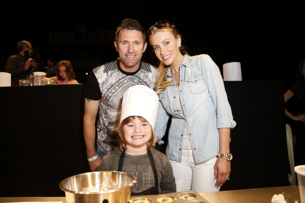 LOS ANGELES, CA - MARCH 23: Robbie Keane, son Robert and Claudine Palmer attends All-Star Chef Classic - Day 3 at LA Live on March 23, 2014 in Los Angeles, California. (Photo by Joe Kohen/FilmMagic)