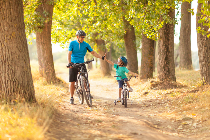 Father and son riding bicycles